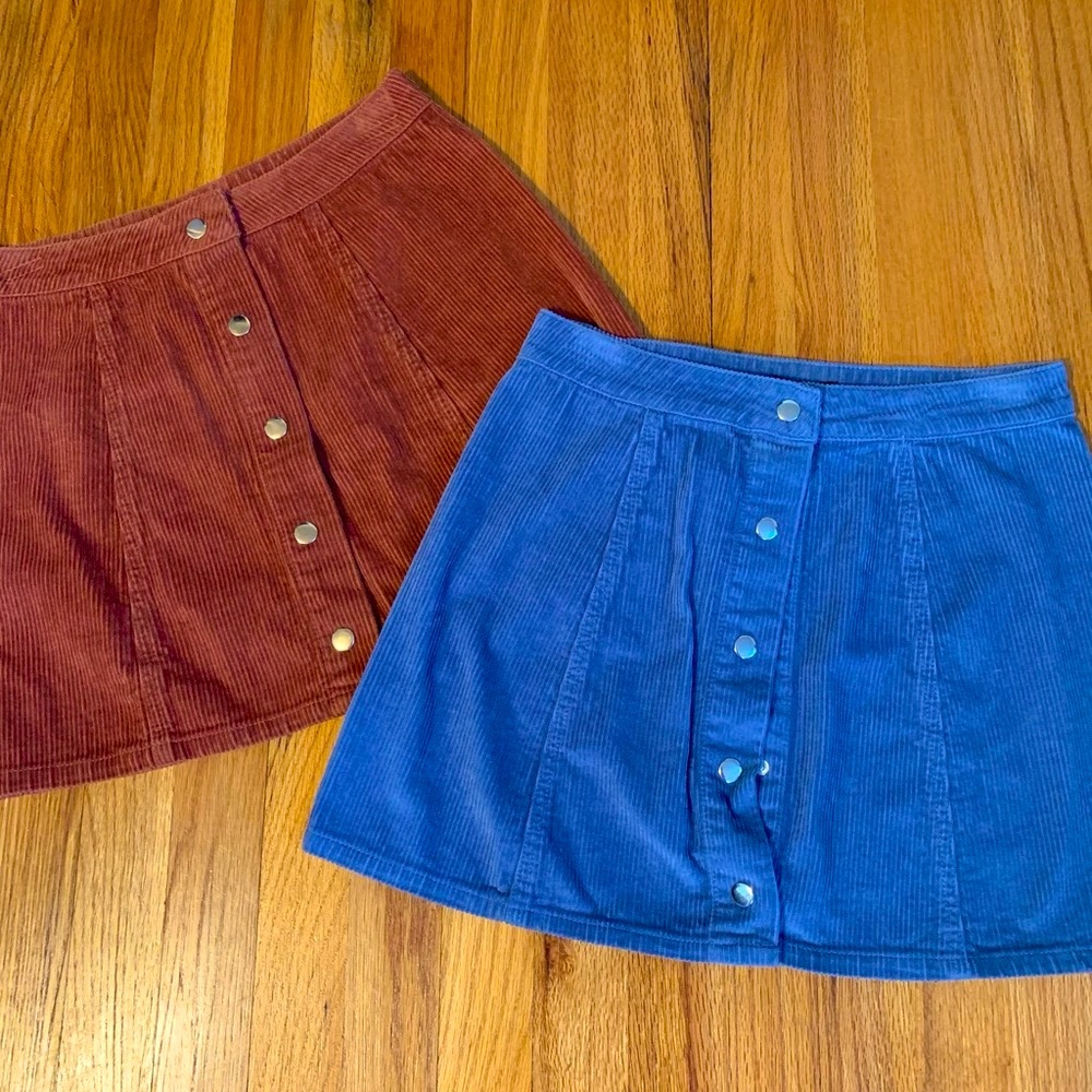 Forever 21 - 2 corduroy snap front mini skirts - set of 2